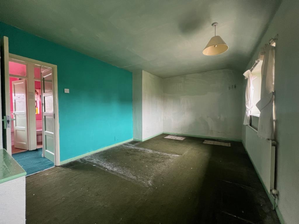 Lot: 13 - TWO-BEDROOM SEMI-DETACHED HOUSE - Bedroom one with window to front and radiator